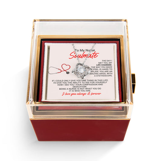 Rotating Rose Nurse Love Knot Necklace